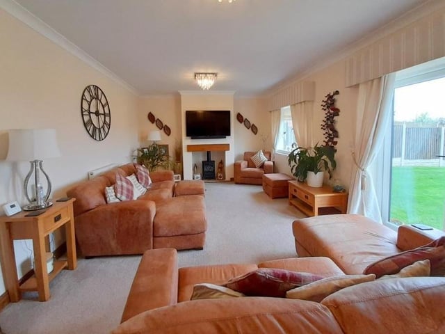 Relaxing and comfortable are the two words that spring to mind to describe the lounge at the Kirkby property. Double-glazed double doors lead out to the back garden.