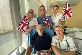 John Carr 'Jack' celebrates his 103rd birthday with staff at King's Mill Hospital.