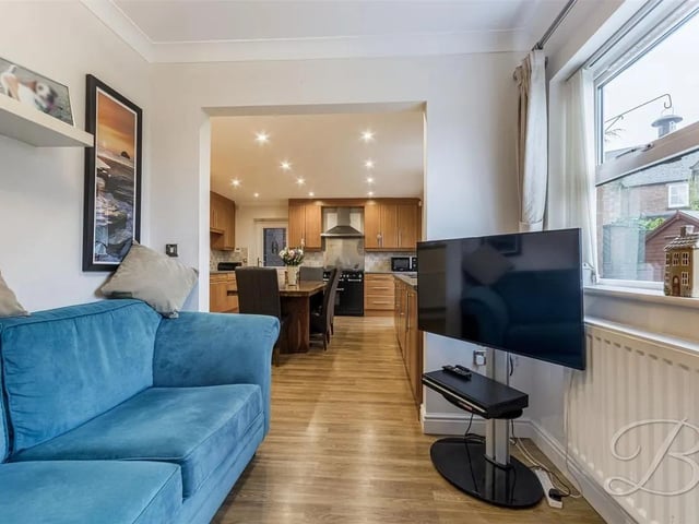 The kitchen/dining/ sitting room is designed for both functionality and comfort, with a neutral tone throughout. The room further benefits from the sitting room area, providing ample space for socialising with family and friends.
