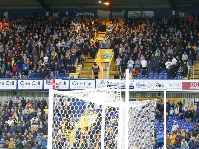Mansfield Town fans watching the draw with Wrexham.