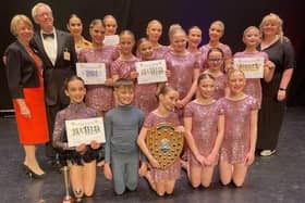 The winners, Excelsior Dance Troupe (aged eight to 18), pictured with the presenters, Paul Bacon, and Katie Trinder from Mansfield 103.2, and the President of Mansfield Rotary, Karen Johnson.