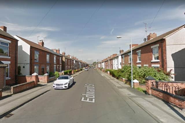 Officers have made two arrests after a woman was robbed on Edward Street in Kirkby yesterday.