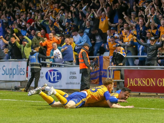 Stephen McLaughlin and Stephen Quinn celebrate the first half goal.