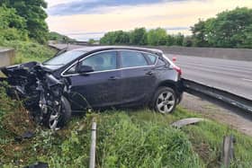 Pictures show the car which was left crumpled by the collision after a driver fell asleep at the wheel on the M1 near Chesterfield this morning (May 22)