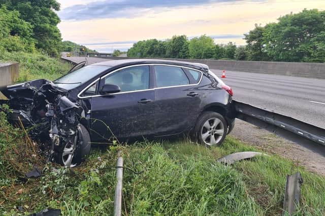 Pictures show the car which was left crumpled by the collision after a driver fell asleep at the wheel on the M1 near Chesterfield this morning (May 22)