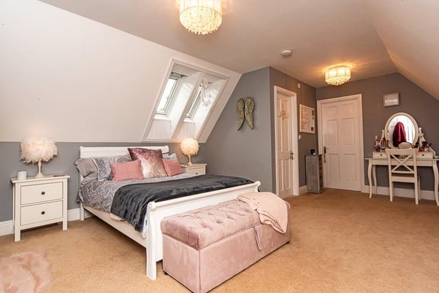 All of the bedrooms can fit "double bed or larger". This room has an en-suite and an attached study.