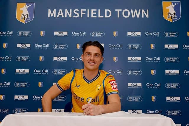 Tom Nicols signs for Stags.