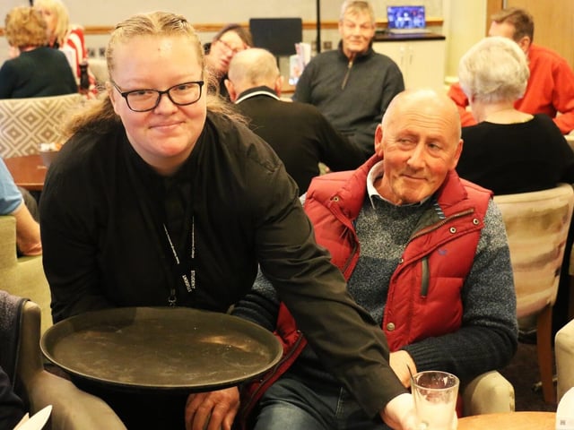 Food and Beverage Service student Chloe Wright with guest Andy Smith in one of two roles that she undertook.