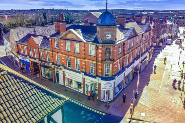 The historic Brunts Chambers building in Mansfield town centre, complete with its turret, clock face and statue.