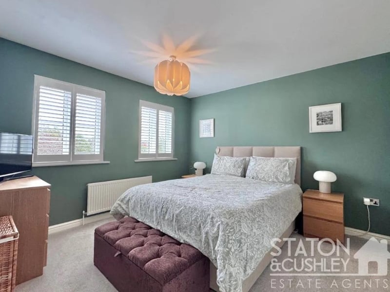 One of four spacious bedrooms in the property.