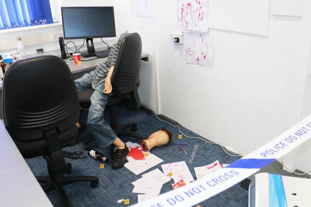 Students had to help solve a 'murder' at a mock crime scene.
