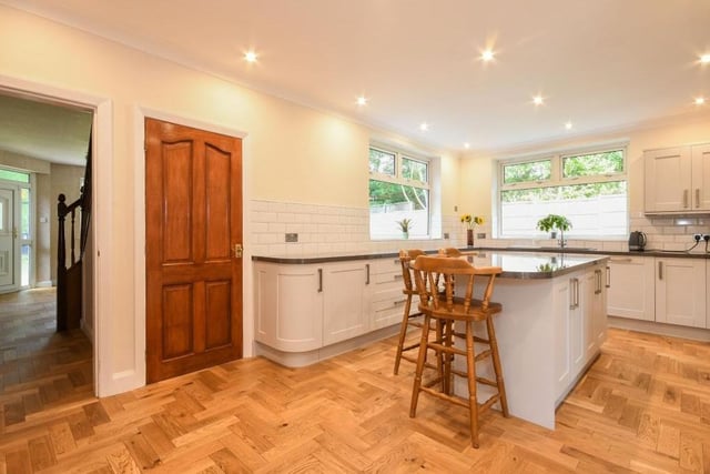 Through the front door and the entrance hallway and into the first ground-floor room to take a look at. It's the breakfast kitchen, which has recently been upgraded. It is fitted with modern wall and base units and boasts integrated appliances, as well as an island.