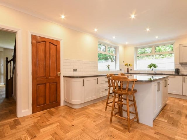 Through the front door and the entrance hallway and into the first ground-floor room to take a look at. It's the breakfast kitchen, which has recently been upgraded. It is fitted with modern wall and base units and boasts integrated appliances, as well as an island.