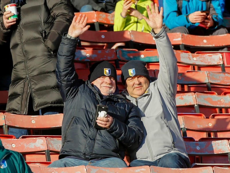 Mansfield Town fans at the defeat to Swindon Town on 25th Nov 2023.