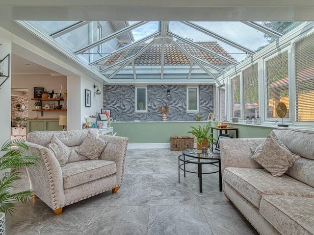 The spectacular and comfortable conservatory from a different angle.