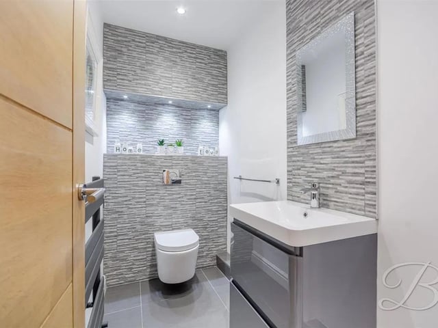 The property is filled with high end finishes throughout. The downstairs WC provides added convenience and functionality