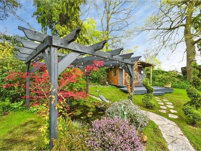 To the rear, there is a well-maintained garden space, offering an excellent outdoor area for relaxation, entertaining, or family use.