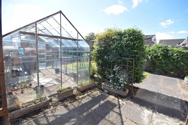 Our last photo of the Ravenshead property shows the patio seating area by the greenhouse at the back. Please get in touch with estate agents Gascoines if you'd like to arrange a viewing.