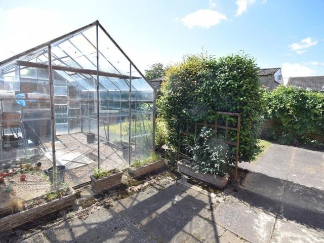 Our last photo of the Ravenshead property shows the patio seating area by the greenhouse at the back. Please get in touch with estate agents Gascoines if you'd like to arrange a viewing.