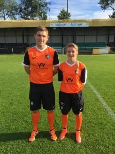 These two model a former Worksop Town home kit.