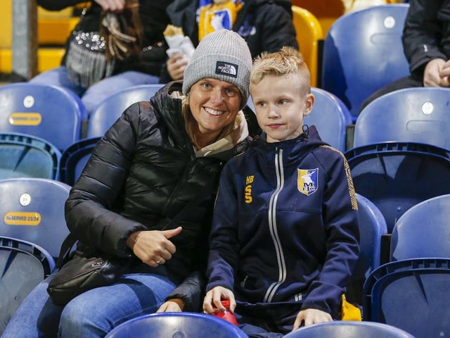 Mansfield Town fans watching the draw with Wrexham.