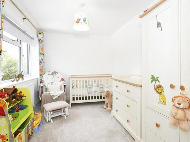 Another child-friendly room is the fourth bedroom at the front of the house. With a carpeted floor, there is plenty of space for cupboards, wardrobes and drawers.