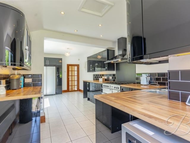 The first room to check out at the Layton Avenue property is the kitchen, which can only be described as superb, especially with its striking, modern decor. It boasts an abundance of worktop and cabinet space.