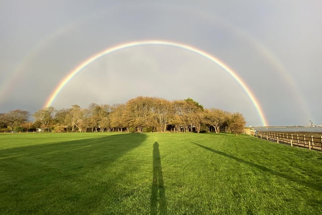This double rainbow, with bright sunshine and tall shadows to boot, was taken in Portchester.