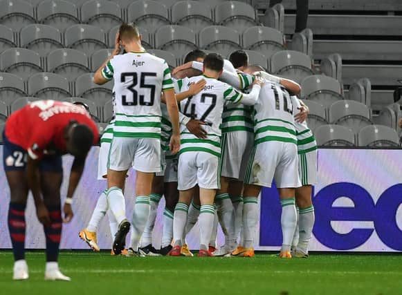 Celtic players celebrate as their side race into a 2-0 lead in Lille. Picture: SNS