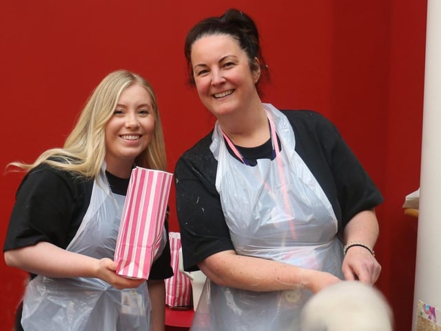 Student coaches Jasmine Clay and Sarah Priestland were giving away free popcorn and candy floss.