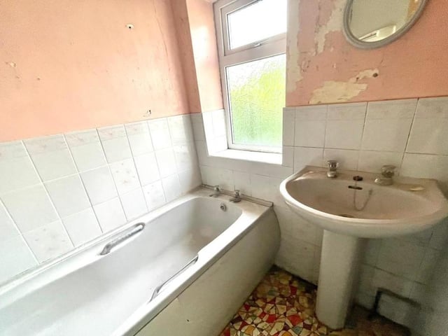 The family bathroom, on the first floor, is crying out for a makeover and a new three-piece suite.