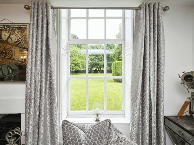 The £120,000-plus Mansfield Woodhouse apartment is clearly a contemporary gem. But it also retains some characterful, traditional features, such as its large windows, which remind you of the building's rich history.