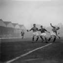 Arsenal Football Club centre forward J Brain breaks through opposing defences during the match against Mansfield Town at Highbury on 26th January 1929.