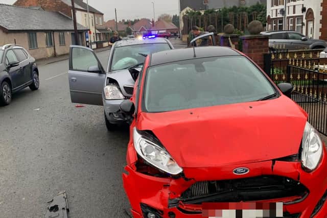 Another angle of the aftermath of a collision outside Brad Waterhouse's home last November, caused by a speeding, stolen car.