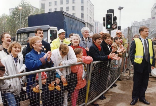 Residents welcoming the tram as it made its first journey into the city in 1993.
