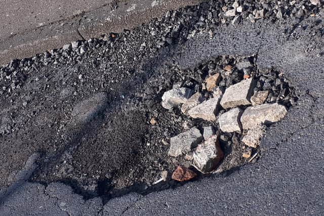 The pothole on Stuart Street in Sutton, which Jamie Sutherland's MPV hit.