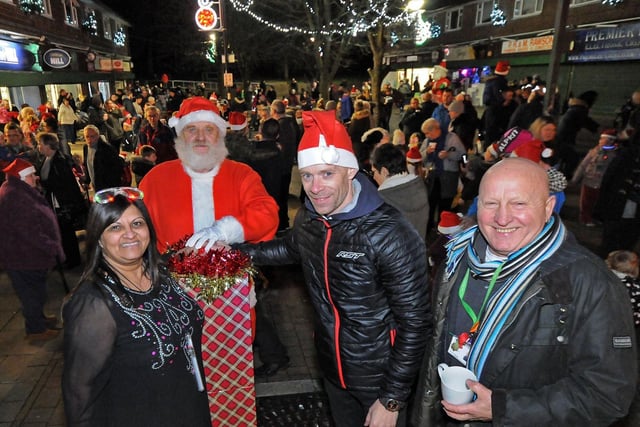 Sidecar-racing champion Ben Birchall is pictured joining the Christmas lights celebrations on Mansfield's Ladybrook Estate three years ago. Its now time for the 2022 version, with the switch-on scheduled at a major community event on Saturday, from 4 pm to 7.30 pm at the Ladybrook Place shops. Santa will be there and he's inviting you too.