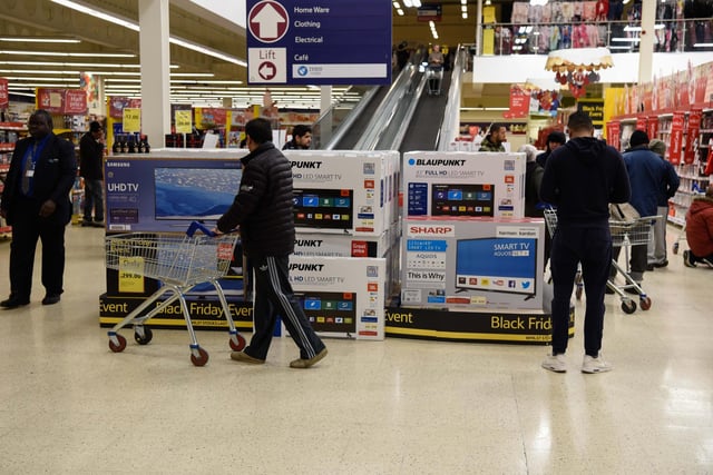 Picture shows shoppers peruse the items on sale at the Tesco superstore in Sheffield in 2016 as part of the Black Friday deals.
