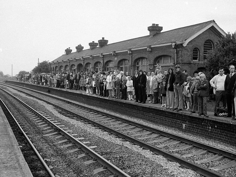 Families waiting patiently for the train