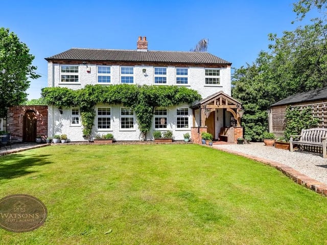 Outside the property enjoys attractive gardens to the front and a substantial gravelled driveway provides ample off road parking