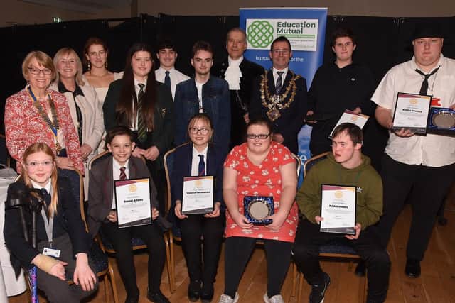 Award winners and dignitaries at the event.