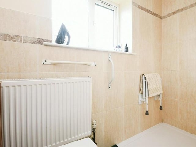 The last photo in our gallery shows the shower room within the annexe at the £330,000 Sutton bungalow.