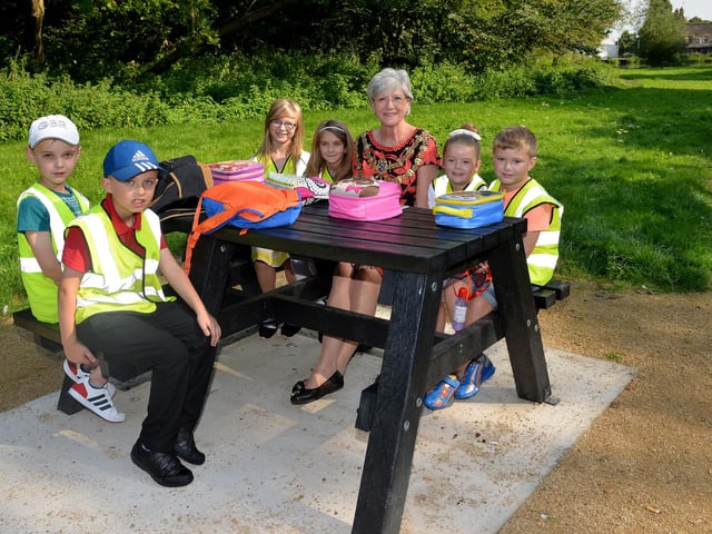 Enjoying nature and a breath of fresh air at the official opening of Quarry Lane Nature Reserve picnic site, Mansfield Executive Mayor Kate Allsop is pictured with children from Sutton Road Primary School in 2016.