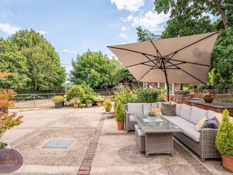 The properties sit on just over two acres of land which has three driveways all with gated access and various patio seating areas, perfect for hosting guests