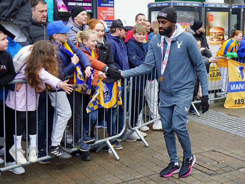 Crowds packed into Mansfield town centre this afternoon to salute their heroes.