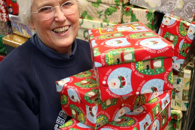 Tessa Hope from Church of the Annunciation with some of the shoeboxes which were sent off in 2009