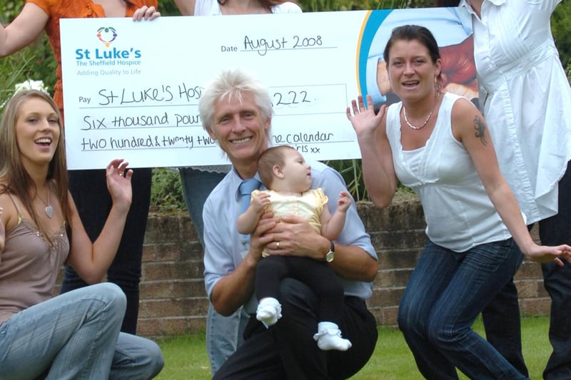 Calendar girls, l/r: Becky Bridges, Emma Young, Anna Miller  in front, Carrera Murray and Sinead Bridges, pictured with Steve Kirk from St Luke's and 7 months old Ruby(the 'bump' on the calendar), in the garden at St Luke's Hospice with the cheque for £6,222 in 2008