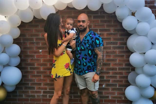 Rio with his parents Luca and Michael.