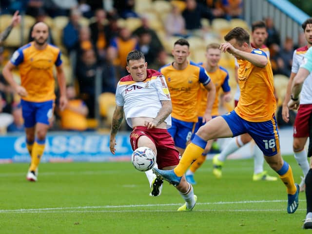 Mansfield Town's Rhys Oates breaks clear against Bradford City, Photo: Chris Holloway.