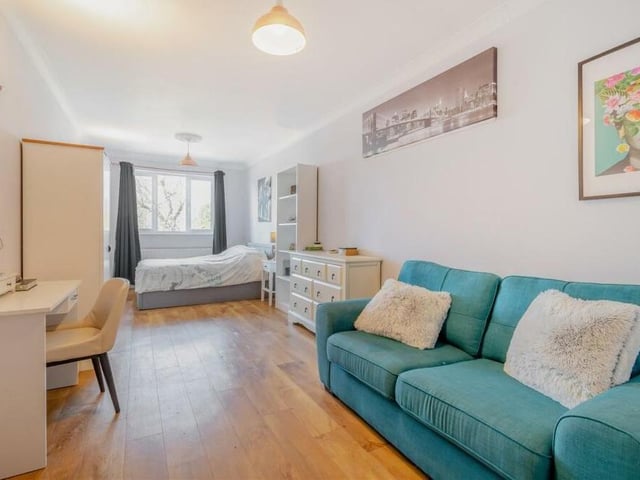 Check out the size of this bedroom! There's more than enough space for furniture, storage space and even a cosy sofa. It faces the front of the property.